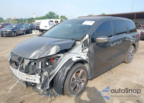 2019 Honda Odyssey Touring z USA, uszkodzony, nr VIN 5FNRL6H83KB103283